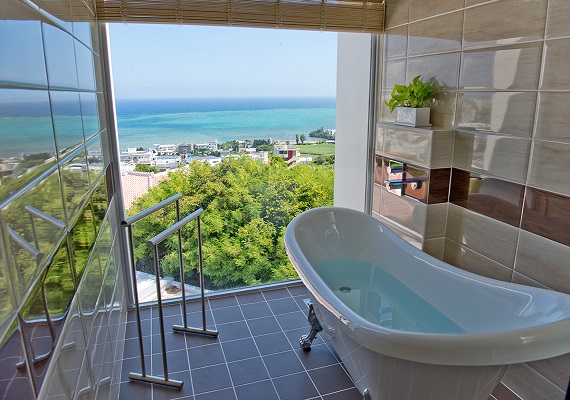 A bath with an amazing view in all guest rooms