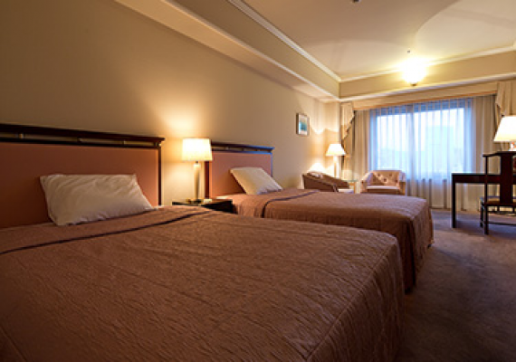 Spacious room and large bed.
A guestroom for coziness.