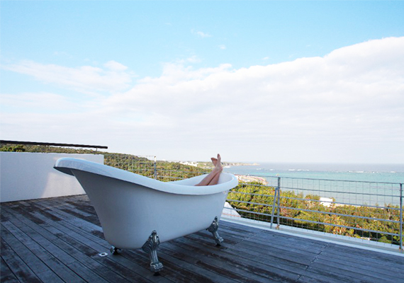 We set bathtub on the rooftop wooden deck 