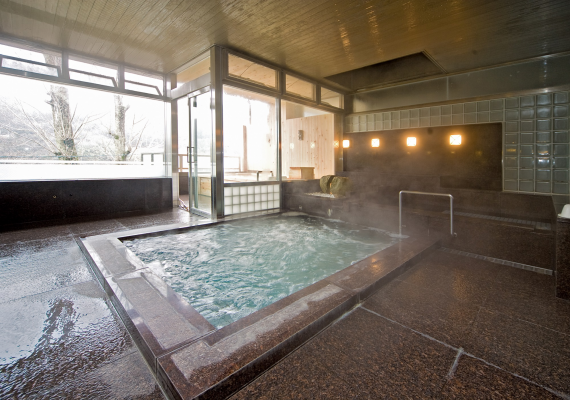 Large communal bath with jacuzzi