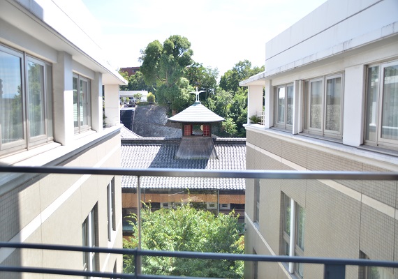 Dogo Onsen main building visible from connecting passageway