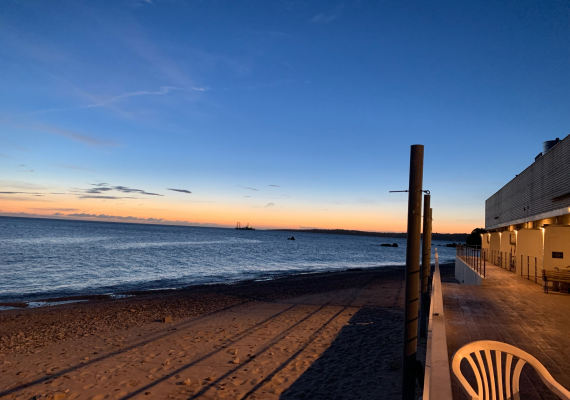 Setting sun over the horizon