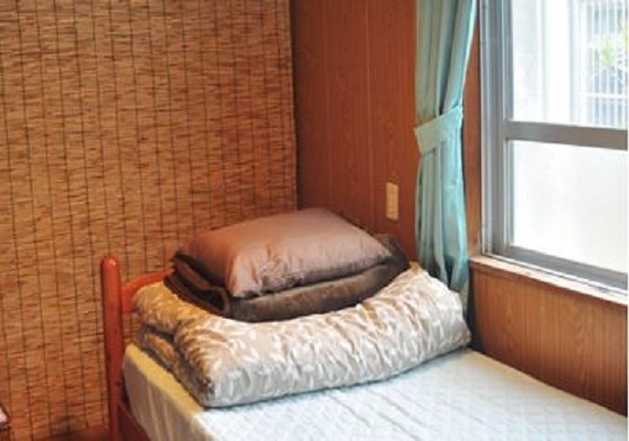 Private room with single bed.