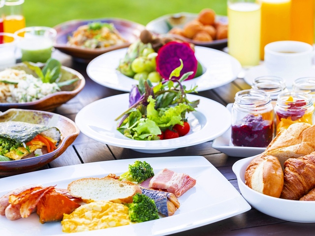 Japanese and western breakfast buffet many kinds of dishes cooked with island vegettable. 