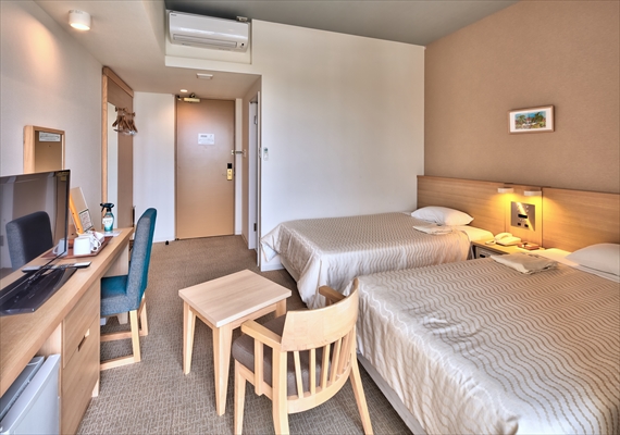 It is a highly functional twin room. Please spend a comfortable time for two people.
