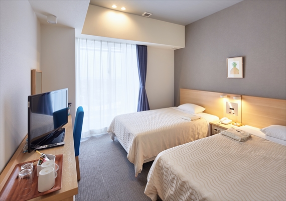 The clean twin room is ideal for couples and friends.